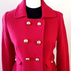 Red waistcoat with gold buttons